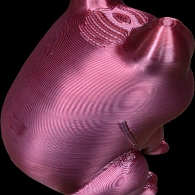 Figura de animal 3D em plástico vermelho metálico com textura de impressão