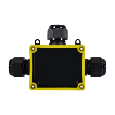 Caixa de junção elétrica preta e amarela com três conexões 