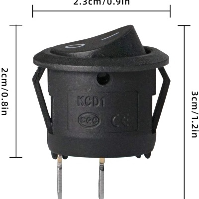 Botão interruptor elétrico preto com marcações e dimensões visíveis