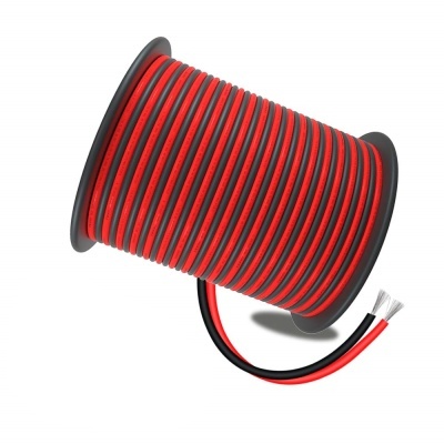 Rolo de fio elétrico preto e vermelho em carretel cinzento