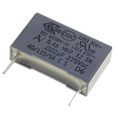 Capacitor eletrônico cinza com terminais metálicos e texto técnico impresso