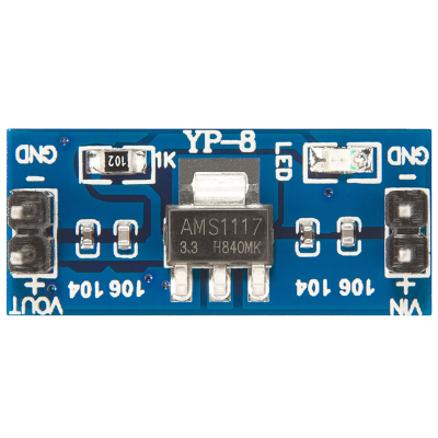 Placa eletrónica azul com componente AMS1117 e LED branco