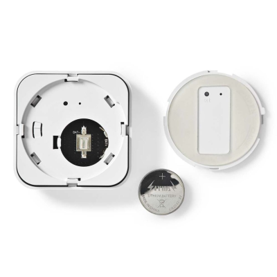 Termóstato digital branco desmontado com bateria e tampa ao lado