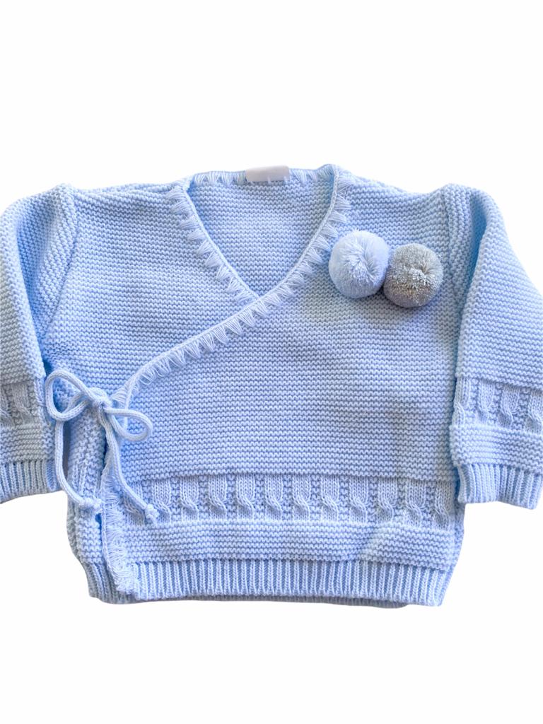 Camisola infantil azul clara em malha com laço e pompons