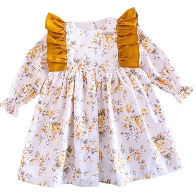 Vestido infantil branco com flores amarelas e detalhes em amarelo mostarda
