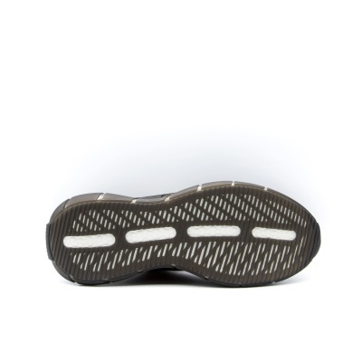 Sola de sapato desportivo em preto com detalhes brancos