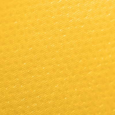 Superfície amarela texturizada com padrão de pontos pequenos