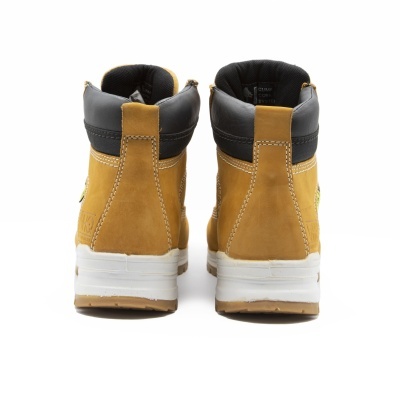 Botas amarelo-mostarda com sola branca vistas de trás