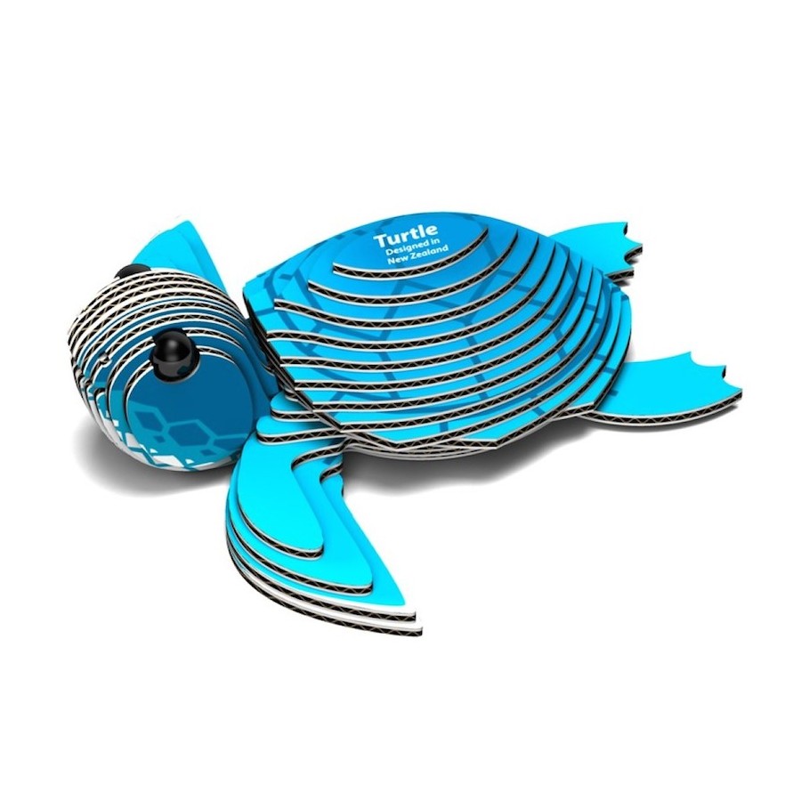 Tartaruga Marinha Eugy Figura azul e preta em forma de tartaruga com texto 'Turtle Designed and Hand-painted'.