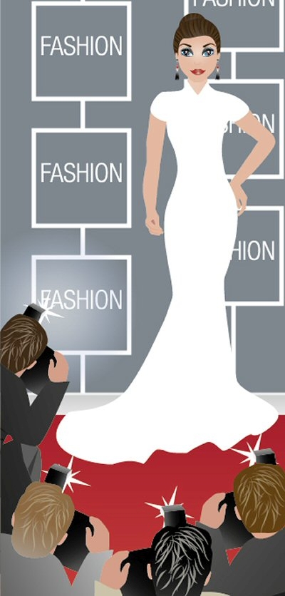 Tip Caixa Style Mulher de vestido branco a posar na passadeira vermelha com fotógrafos e painéis com a palavra FASHION