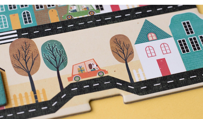 Jogo O Carteiro Tapete infantil com ilustração de estrada, casas e árvores coloridas