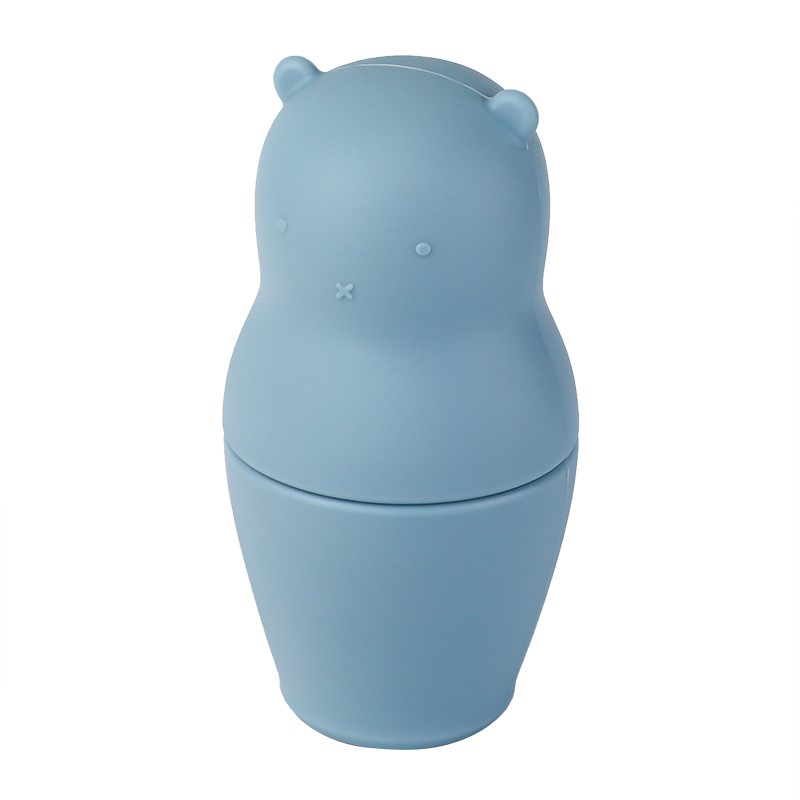 Bonecas Russas Ursos Azuis Recipiente azul em forma de boneco com tampa, sobre fundo branco