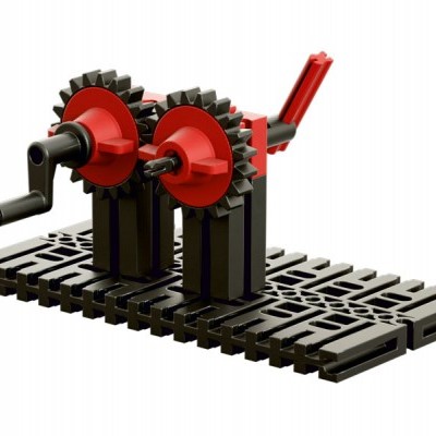 Ferramenta manual com rodas com engrenagens e manivelas sobre base preta