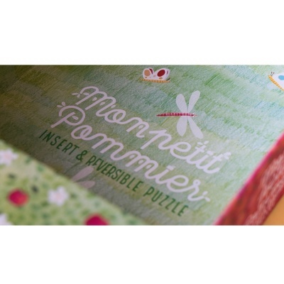 caixa de puzzle infantil verde com texto e desenhos de insetos