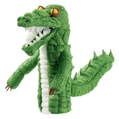 Fantoche de mão em forma de crocodilo verde com dentes e garras detalhadas.