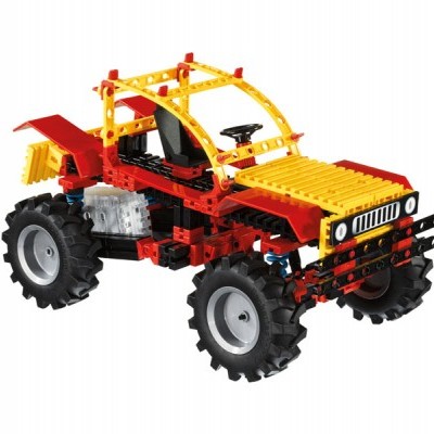 Modelo de carrinha de brincar com blocos amarelos, vermelhos e pretos e pneus grandes