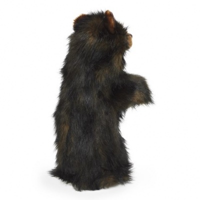 Boneco de pelúcia de animal castanho escuro em posição vertical