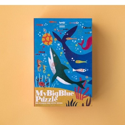 Caixa de puzzle colorida com animais marinhos