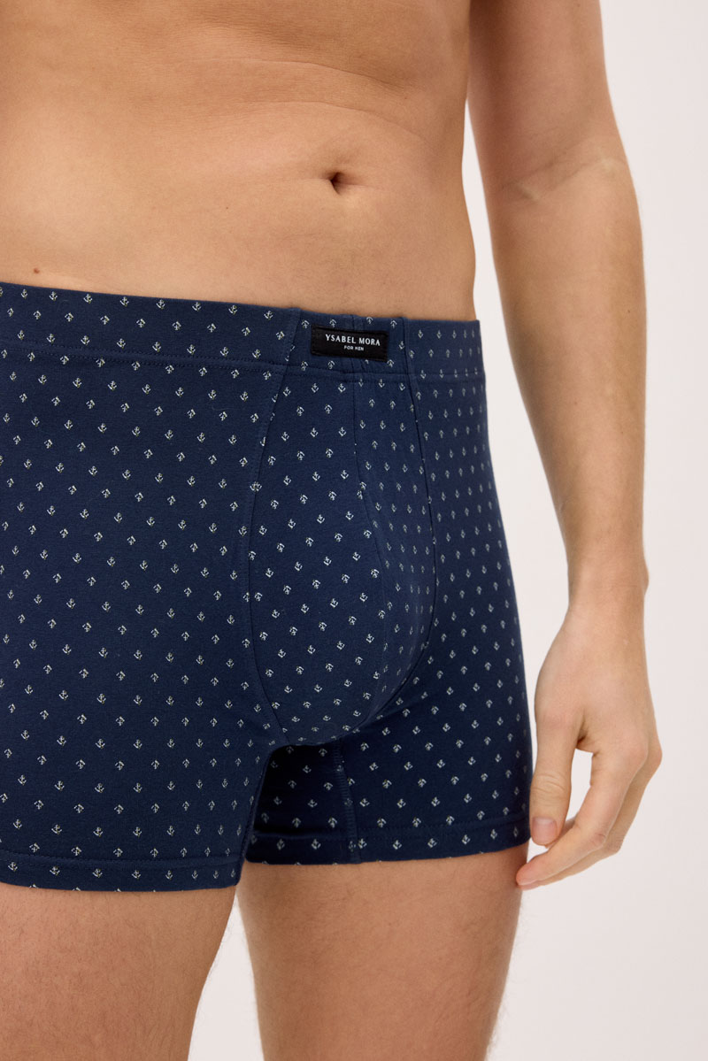 Cuecas boxers azuis escuras com padrão de âncoras e etiqueta YSABEL MORA
