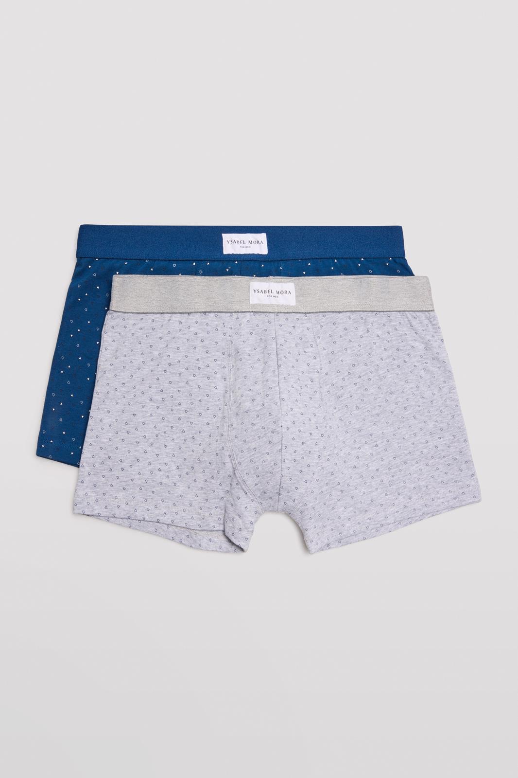 Dois boxers de algodão azul escuro e cinzento claro com padrões de pontos e cós elástico com etiqueta da marca
