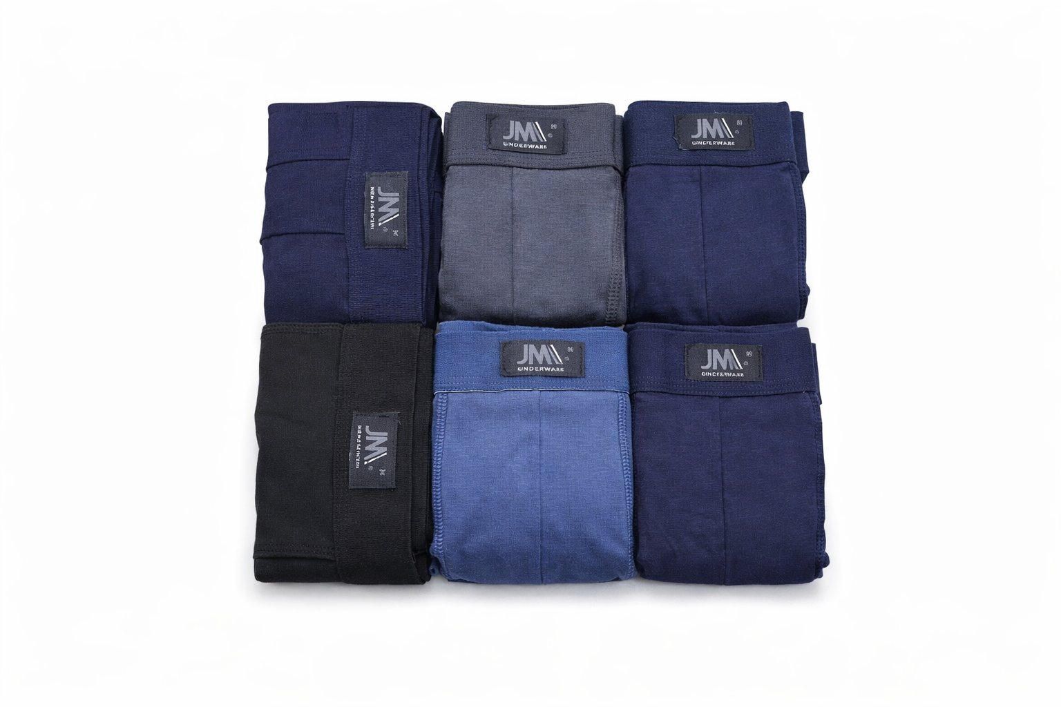 Seis peças de roupa interior masculinas dobradas em várias cores com etiquetas JM UNDERWEARE
