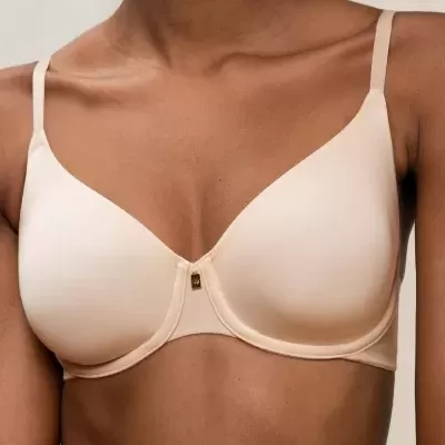 Soutien bege claro com aro e alças finas, detalhe dourado no centro