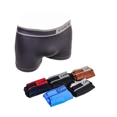 Cuecas boxer multicoloridas com elástico da marca CARCI em fundo branco