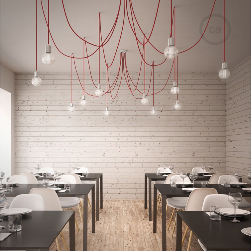 ARANHA 5 | 6 | 7 CROMADO | VERMELHO Sala de jantar moderna com mesas pretas, cadeiras brancas e luzes pendentes com cabos vermelhos