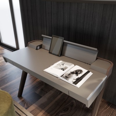 Secretária cinzenta moderna com tablet e revista aberta em ambiente interior