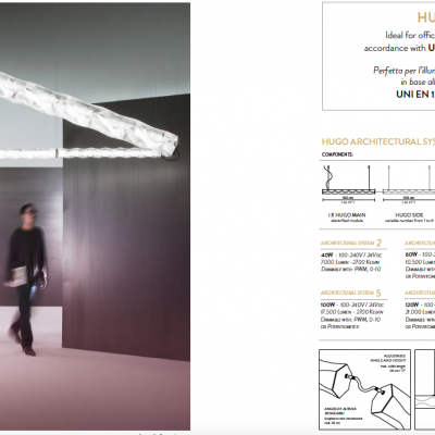 Luminária pendente moderna em tubos de vidro em forma de zig-zag suspensos num interior minimalista.