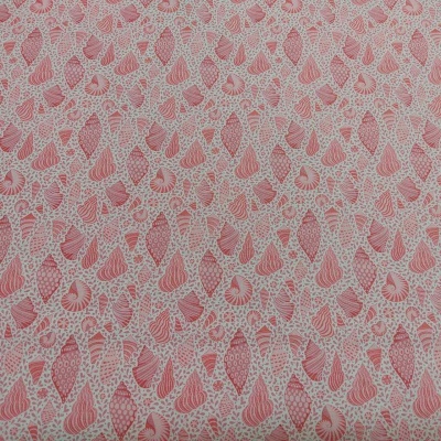 tecido com padrão repetitivo de gotas rosa e branco