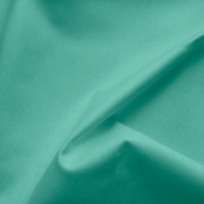 tecido verde água liso com dobras suaves