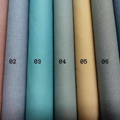 Sete tecidos coloridos numerados de 01 a 07 com textura e padrão visível