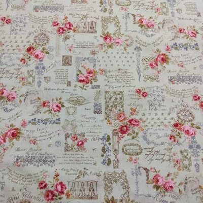 tecido vintage com flores cor-de-rosa, selos e texto em francês