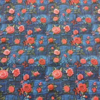 Tecido azul escuro com padrão de rosas vermelhas e cor-de-rosa