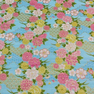 Tecido com padrão floral colorido sobre fundo azul