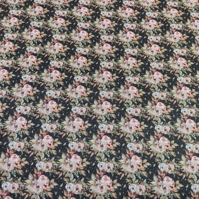 Tecido com padrão floral repetitivo em fundo preto