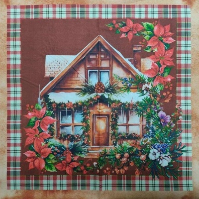Toalha natalícia com imagem de casa decorada e flores coloridas