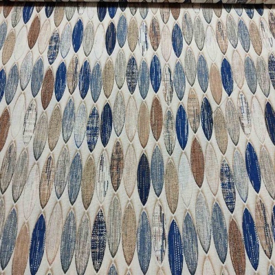 tecido branco com padrão de ovais em azul, castanho e bege