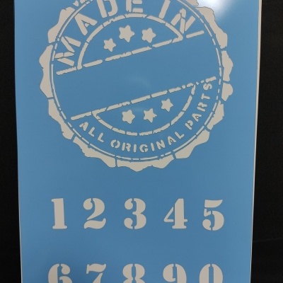 Molde stencil azul com selo circular MADE IN ALL ORIGINAL PARTS! e números stencil 0 a 9