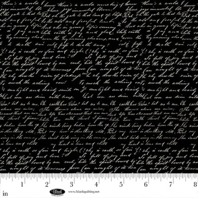 Tecido preto com texto manuscrito branco e régua de medição