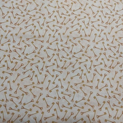 tecido branco com padrão de chaves castanhas