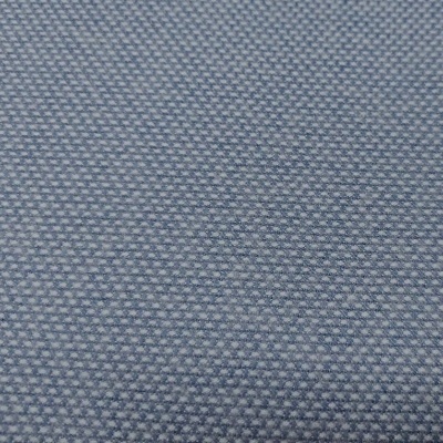 Tecido azul claro com padrão de losangos pequenos