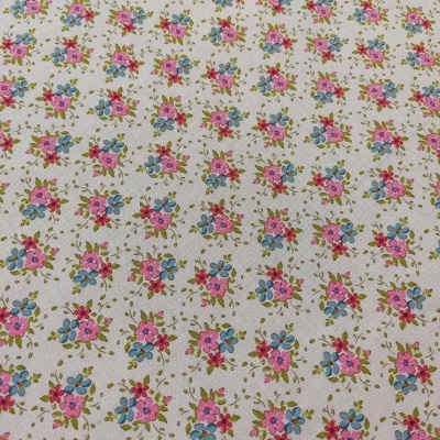 Tecido com padrão floral pequeno colorido em fundo bege