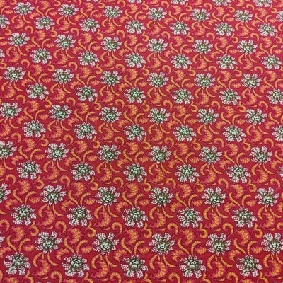 tecido vermelho com padrão floral colorido