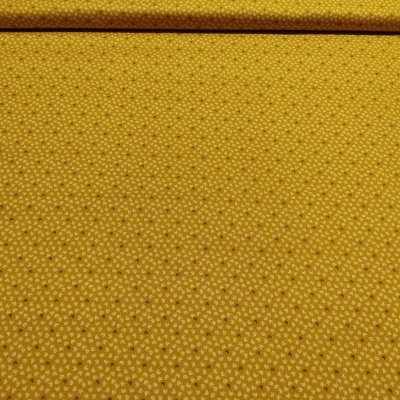 tecido amarelo mostarda com padrão de pequenas flores