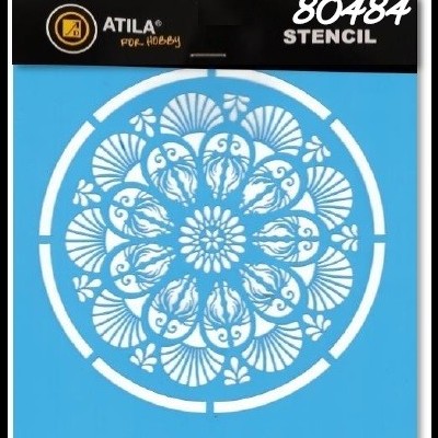 Estêncil redondo azul com padrão floral branco e embalagem preta com texto