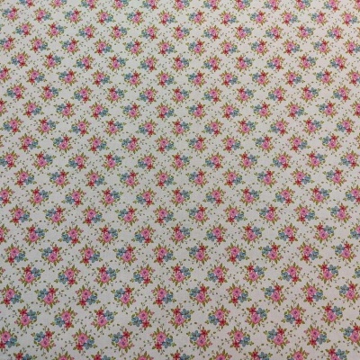 Tecido branco com padrão floral colorido