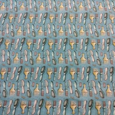 Tecido azul com padrão de pincéis em várias cores e texturas