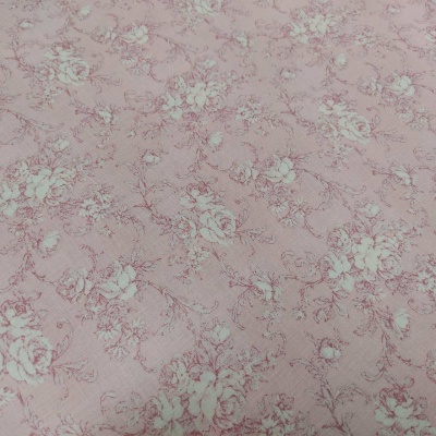 Tecido rosa com padrão floral branco
